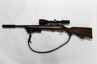 A CZ452 cal 22 LR bolt action rifle, fitted with an A-Tech Wave sound moderator,