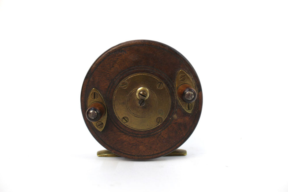 Allcocks & Co Makers Redditch, a brass and wooden star back reel, +/- 3 1/2".