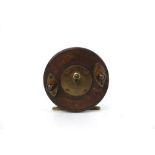 Allcocks & Co Makers Redditch, a brass and wooden star back reel, +/- 3 1/2".