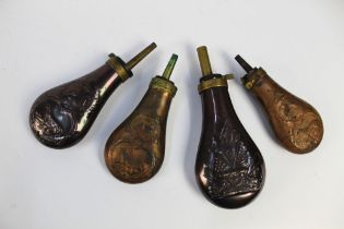 Four powder flasks, one decorated with stars and stripes flags and cannon,