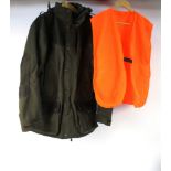 A Seeland shooting jacket Size EU50, together with a Seeland orange vest.