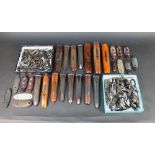 A selection of shotgun parts, or gunsmithing spares to include fore ends, various hammers,