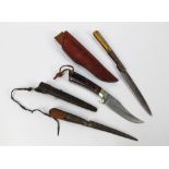 Three hunting knives, a Winchester Comanche fixed blade with a 4 1/2" blade with sheath,