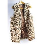 Taxidermy - A rabbit fur waistcoat with leopard spot print, length 75 cm,