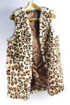 Taxidermy - A rabbit fur waistcoat with leopard spot print, length 75 cm,