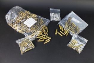 A quantity of brass cartridge cases, to include 148, 7.