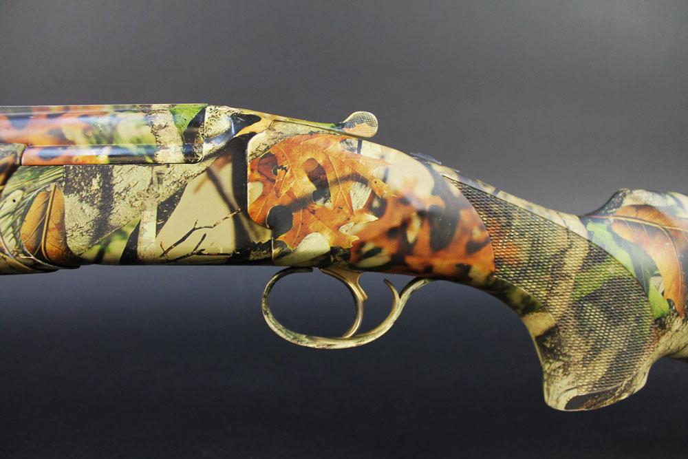 A Bettinsoli XTrail 12 bore over/under shotgun, wrapped in Vista camouflage, with 30" barrels, - Image 9 of 11