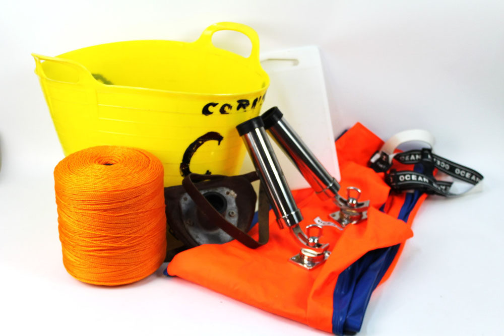 A pair of Ocean waterproof bib and brace, stainless steel boat rod holders, large spool of rope etc.