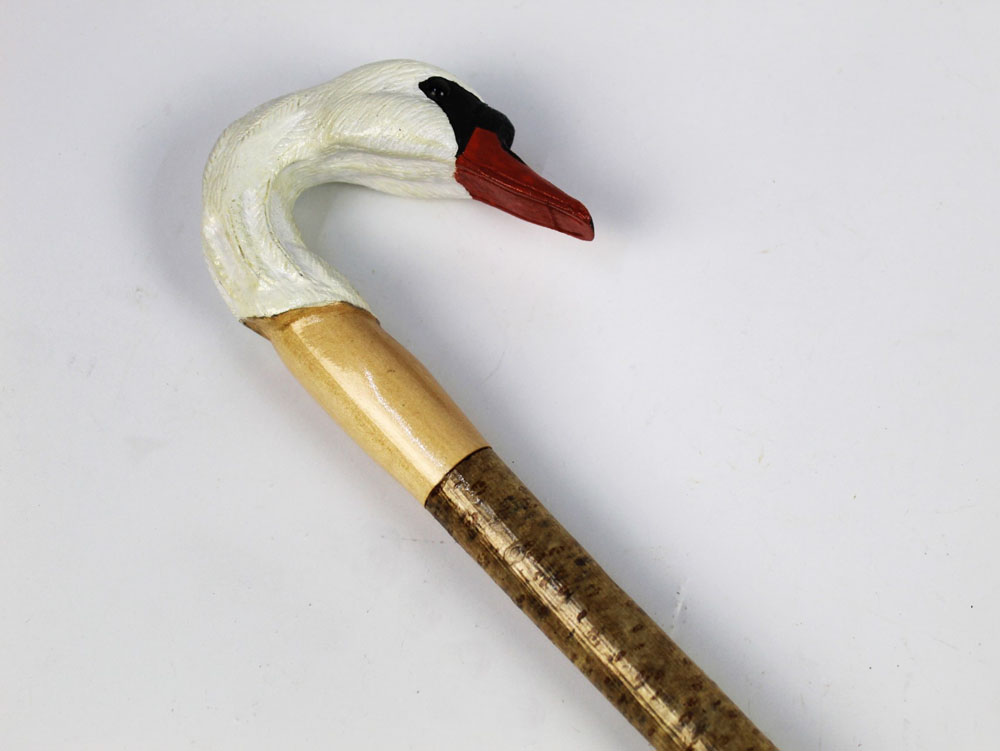 A walking stick with carved wooden handle in the form of a swan. Length 123 cm.