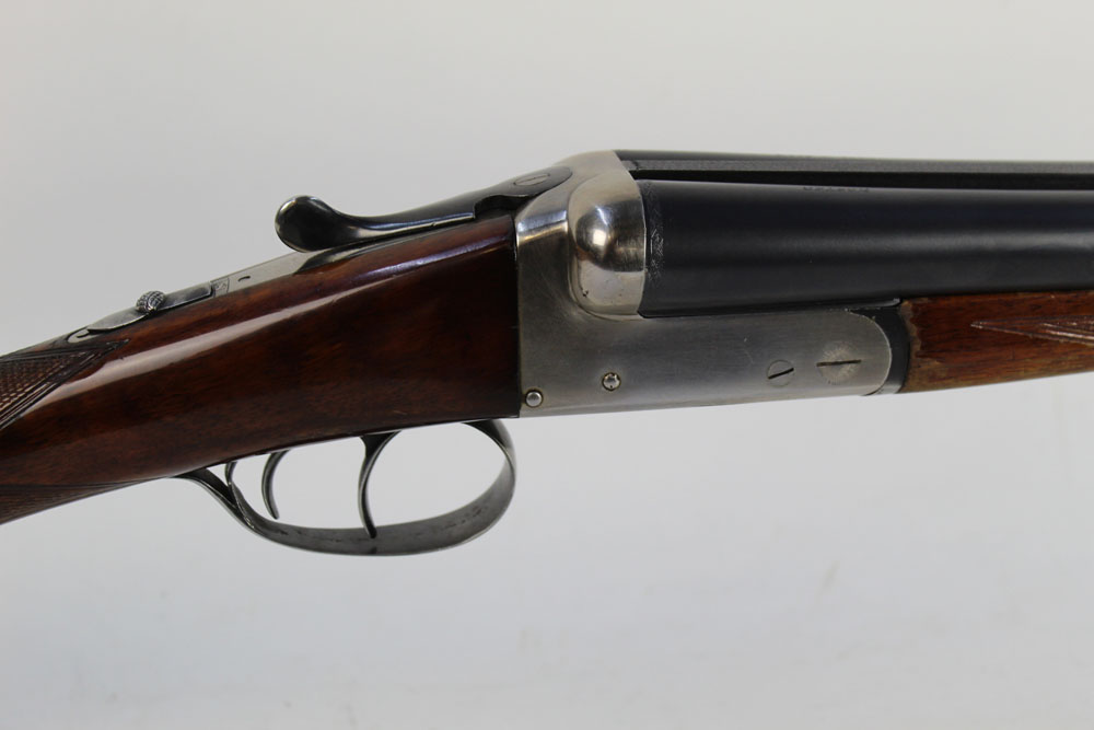 A Master 12 bore side by side shotgun, with 27 3/4" barrels, improved and full choke,