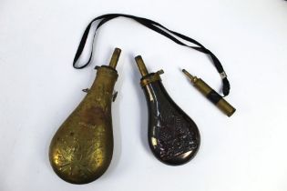 Two reproduction powder flasks,
