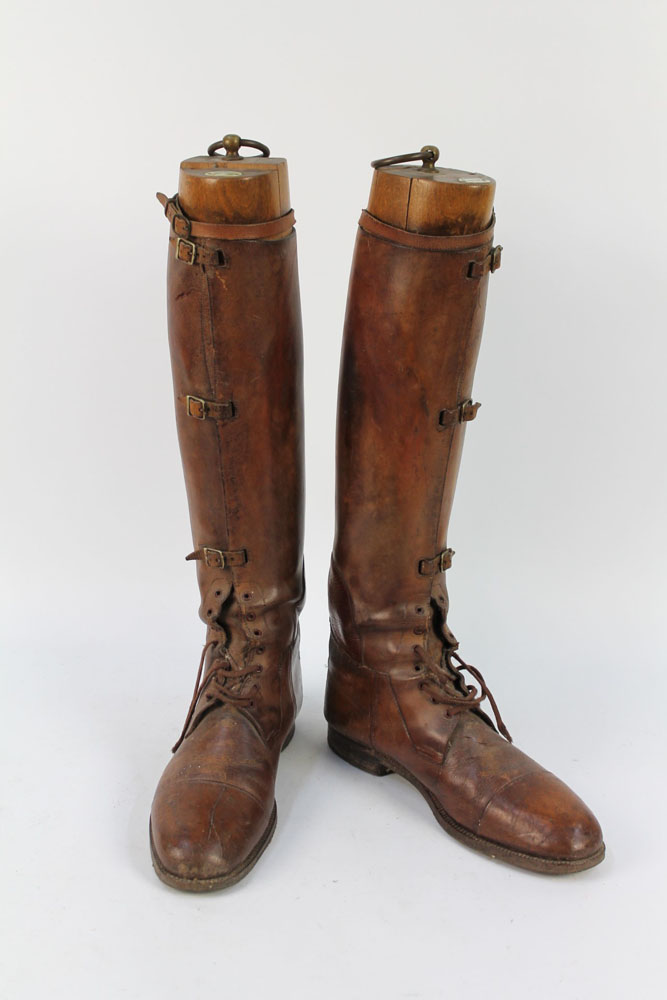 A pair of ladies tan leather riding boots,