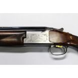 A Browning 325 12 bore over/under shotgun, with 30" multi choke barrels, comes with five chokes,