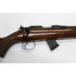 A CZ 452 American cal 22 LR bolt action rifle, fitted with a ten shot detachable magazine,