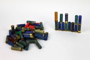 A box containing sixty 16 bore shotgun cartridges,