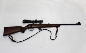 An Anschutz Model 1422 cal 22 LR bolt action rifle, fitted with a Simmons Whitetail Classic 1.