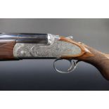 Caesar Guerini a Maxum 28 bore over/under shotgun, with 32" multi choke barrels,