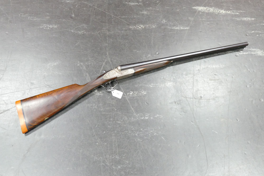 Denton & Kennell a 12 bore side by side shotgun, with 26 3/4" barrels, improved and quarter choke,