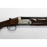 An Angelo Zoli 12 bore over/under shotgun, with 27 1/2" barrels, improved and improved choke,