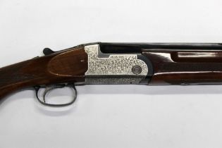 An Angelo Zoli 12 bore over/under shotgun, with 27 1/2" barrels, improved and improved choke,