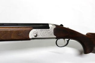 Kofs a 28 bore over/under shotgun, with 28" multi choke barrels, comes with five chokes, choke key,