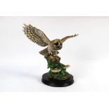 Border Fine Arts a figure of a tawny owl, signed Ayres dated 1986,