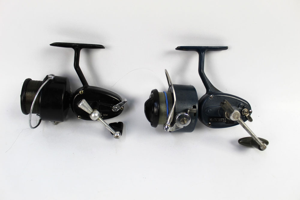 A Mitchell 410A fixed spool reel and a Mitchell 350 fixed spool reel.