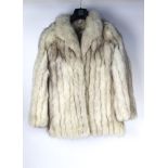 Taxidermy - A Saga fox vintage fur coat, length +/- 74 cm, armpit to armpit +/- 50 cm.