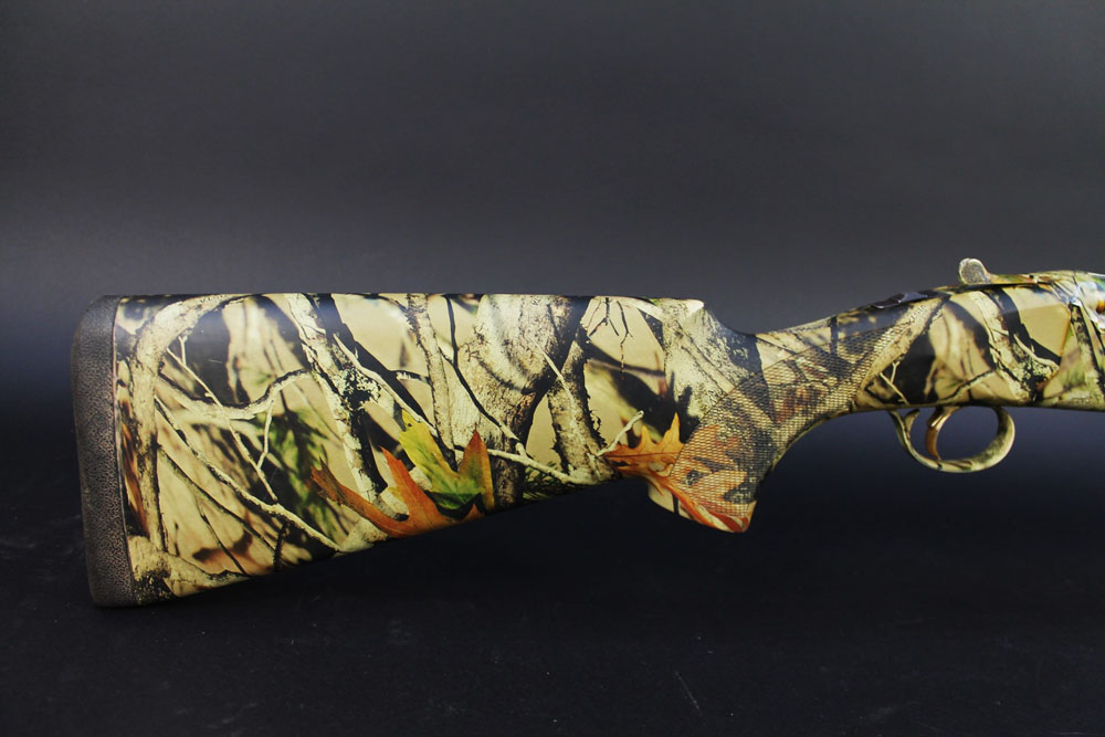 A Bettinsoli XTrail 12 bore over/under shotgun, wrapped in Vista camouflage, with 30" barrels, - Image 5 of 11