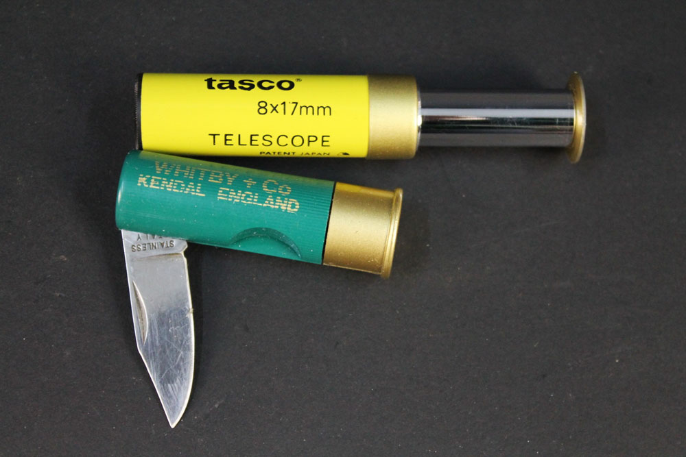 A Tasco 8 x 17mm telescope in the form of a shotgun cartridges,