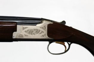 A Browning Citori shotgun, made in Japan by Maroku with two sets of barrels, the first 20 bore,