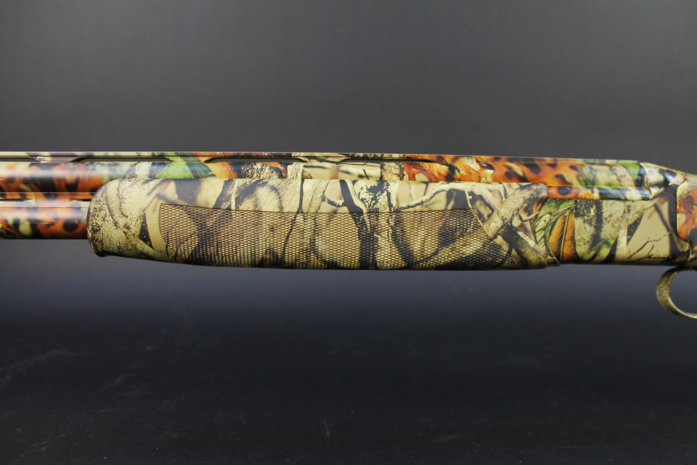 A Bettinsoli XTrail 12 bore over/under shotgun, wrapped in Vista camouflage, with 30" barrels, - Image 8 of 11