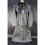 A Jack Murphy Malvern Ladies Long Waterproof Coat. Size 16, new and unused. Retails for £155.