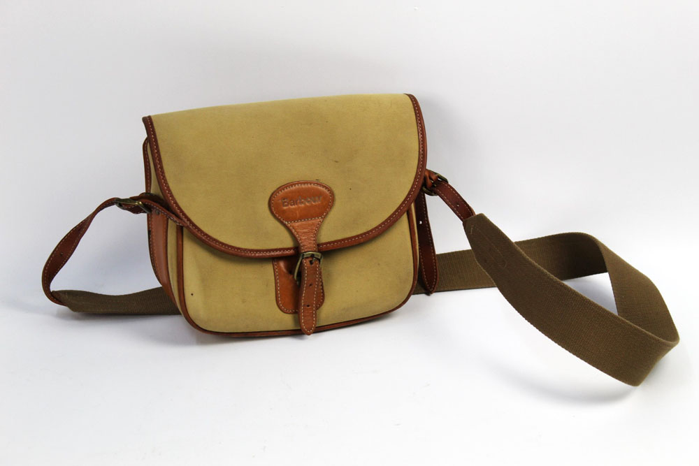 A Barbour canvas and leather cartridge bag.