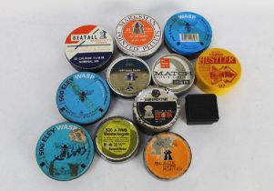 A quantity of air gun pellet tins, part and empty, to include Beat All, Marksman, Eley Wasp etc.