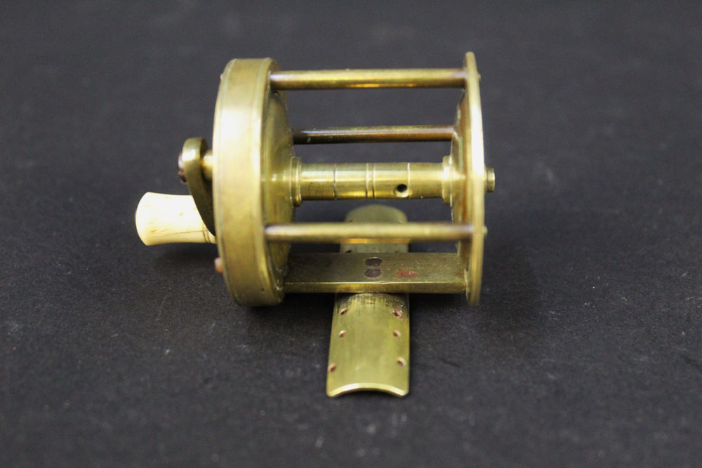 An Ustonson brass pole winch fishing reel, marked to the side Ustonson maker to His Majesty, - Image 5 of 5