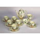 A Royal Doulton Coppice pattern coffee set, with coffee pot, milk, sugar, six cups and saucers,
