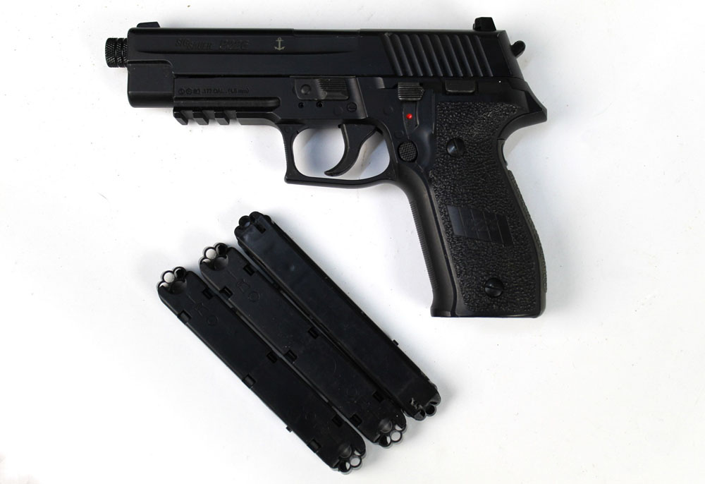 A Sig Sauer P226 CO2 powered air pistol, with three magazines. Serial No. 16G32622.