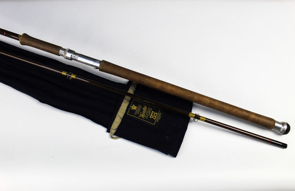 A Hardy Fibalite spinning rod, in two sections, 10'.