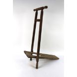 A folding wooden boot pull, early 20th century.