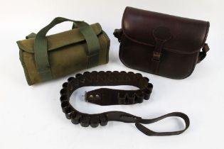 A leather cartridge bag, together with a cartridge belt and a canvas cartridge bag/magazine.