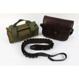 A leather cartridge bag, together with a cartridge belt and a canvas cartridge bag/magazine.