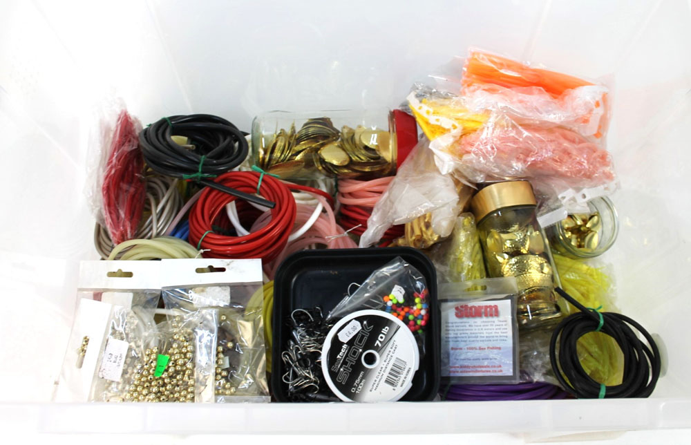 A large box of Flying C making equipment, rubber tubing, spinner blades,