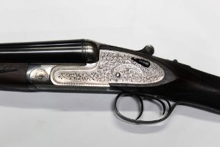 A Gorosabel Silver Deluxe 12 bore side by side shotgun, with 27" barrels,