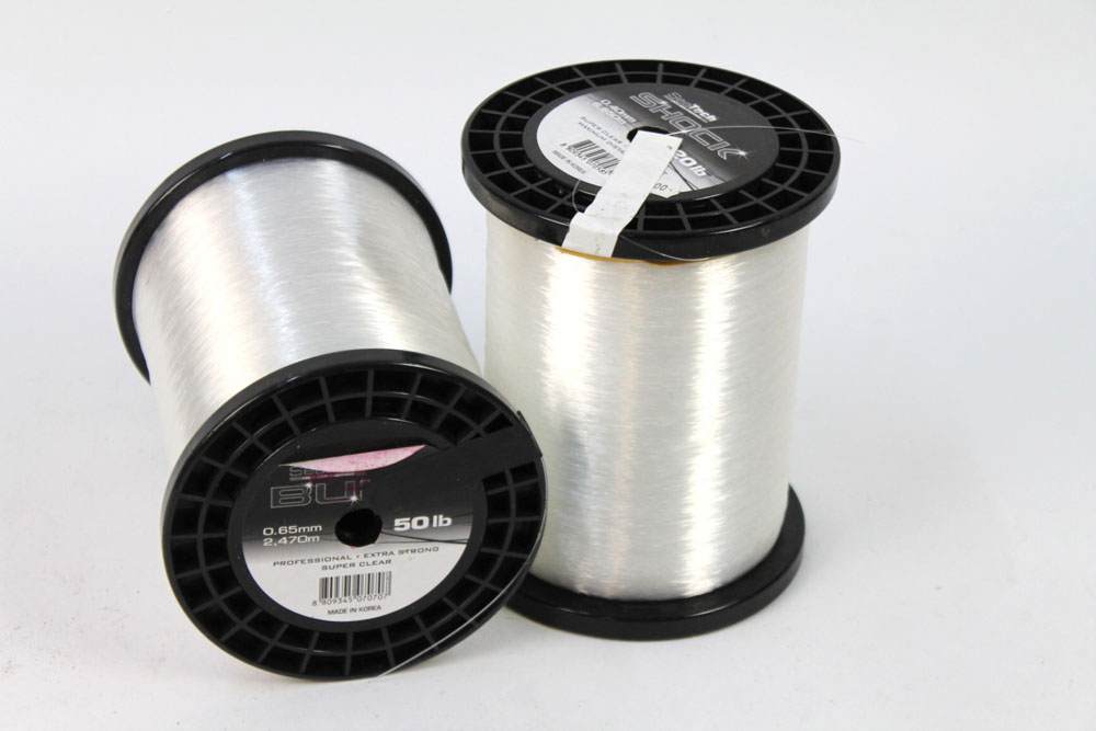 Two large spools of Seatech shock leader, 20 lb and 50 lbs.