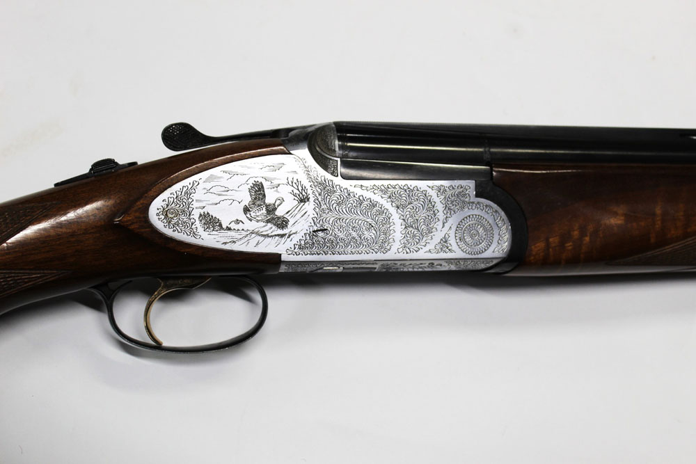 A Rizzini 12 bore over/under shotgun, with 27" multi choke barrels, comes with four chokes, - Image 4 of 4