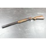 A Laurona 12 bore over/under shotgun with 27" barrels, three quarter and half choke, 3" chambers,