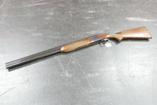 A Laurona 12 bore over/under shotgun with 27" barrels, three quarter and half choke, 3" chambers,