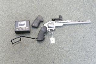 A Taurus 357 Magnum long barrelled revolver, with a 12" barrel,