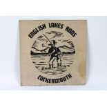 An English Lakes Rods of Cockermouth advertising sign. 38 x 38 cm.